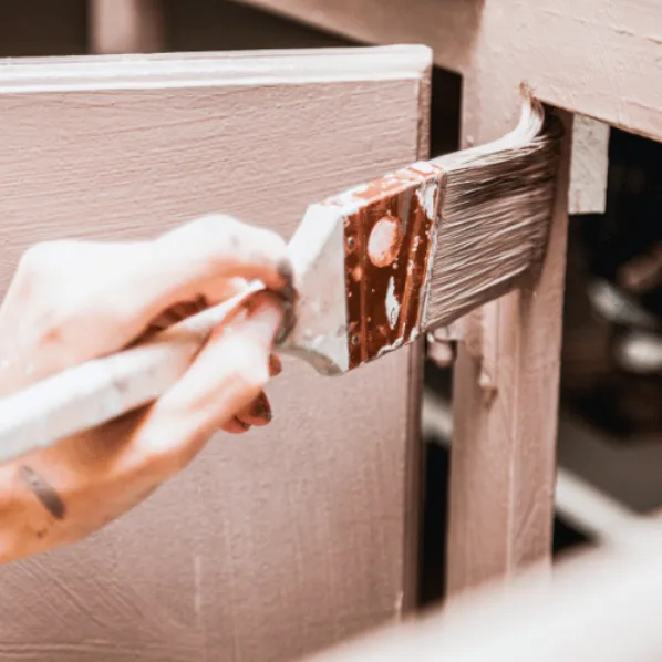Painter working on exterior
